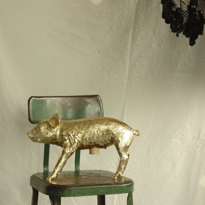 reality-bank-in-the-form-of-a-pig-gold-chrome-3